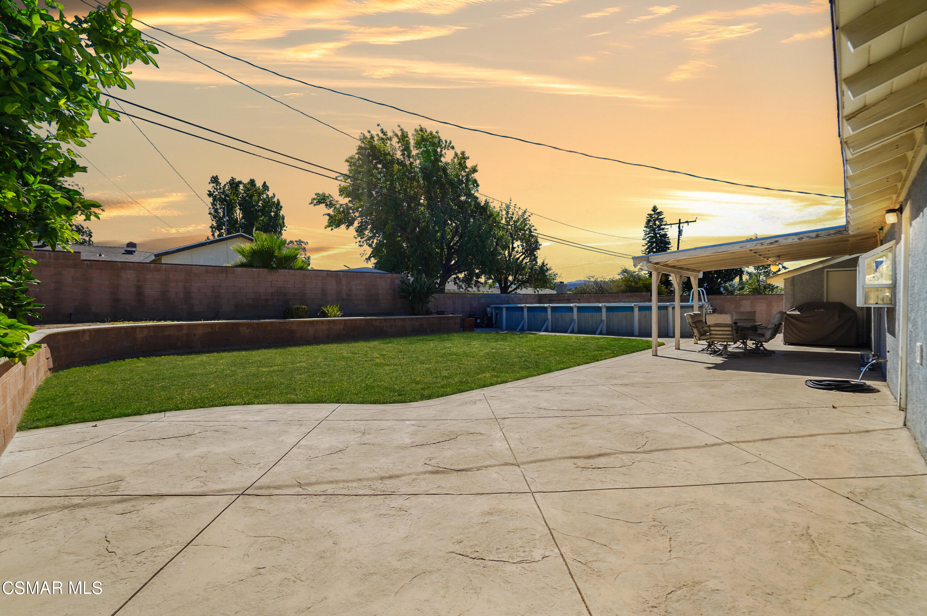3148 Waco Avenue Simi Valley, CA 93063 - Photo 21 of 24 a view of a street with a small garden