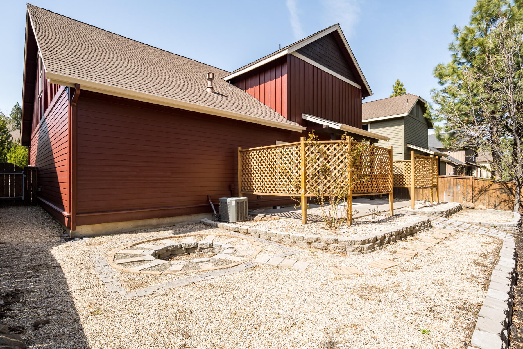 61462 Linton Loop Bend, OR 97702 - Photo 33 of 36 back yard fire pit/patio