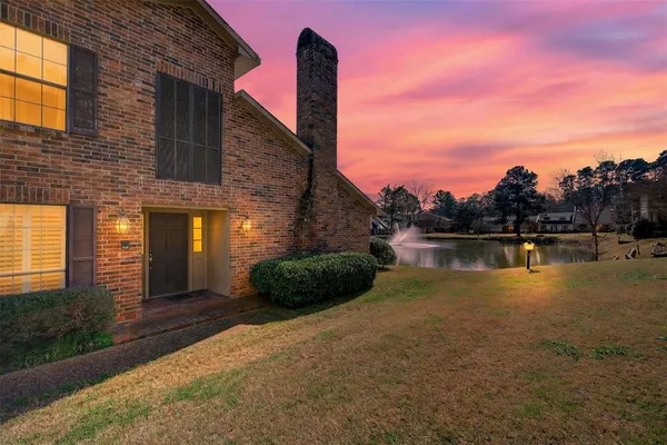 a view of a house with a lake view