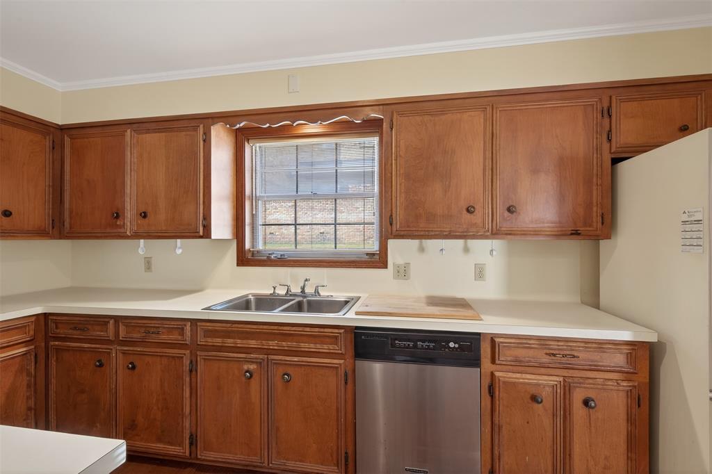 300 Pierremont Road, Unit 25 Shreveport, LA 71106 - Photo 13 of 34 a kitchen with a sink cabinets and window
