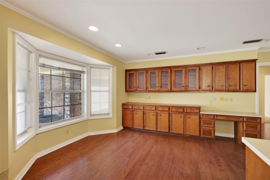 300 Pierremont Road, Unit 25 Shreveport, LA 71106 - Photo 15 of 34 a large kitchen with stainless steel appliances wooden floors and large window