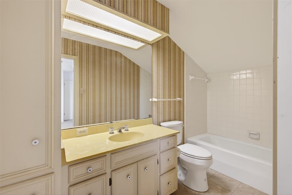 300 Pierremont Road, Unit 25 Shreveport, LA 71106 - Photo 26 of 34 a bathroom with a granite countertop sink toilet and shower