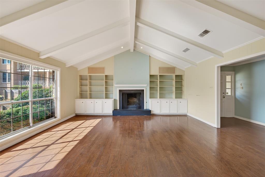 300 Pierremont Road, Unit 25 Shreveport, LA 71106 - Photo 7 of 34 a view of an empty room with wooden floor and a window