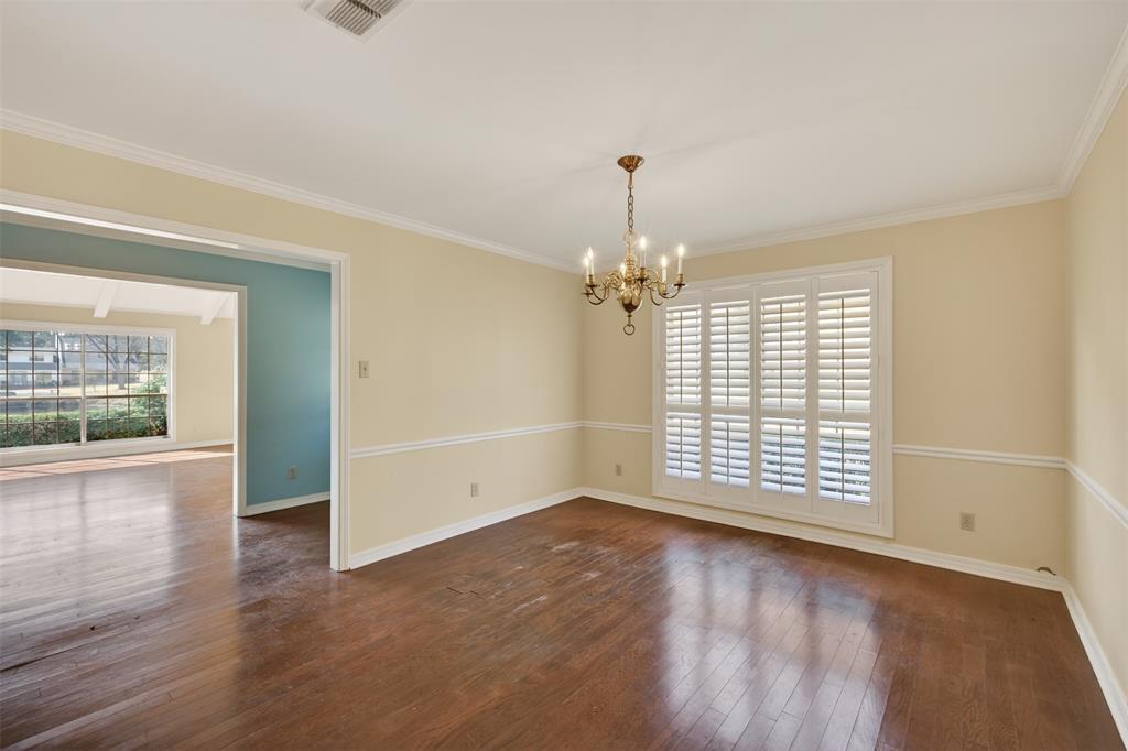 300 Pierremont Road, Unit 25 Shreveport, LA 71106 - Photo 9 of 34 an empty room with wooden floor and windows