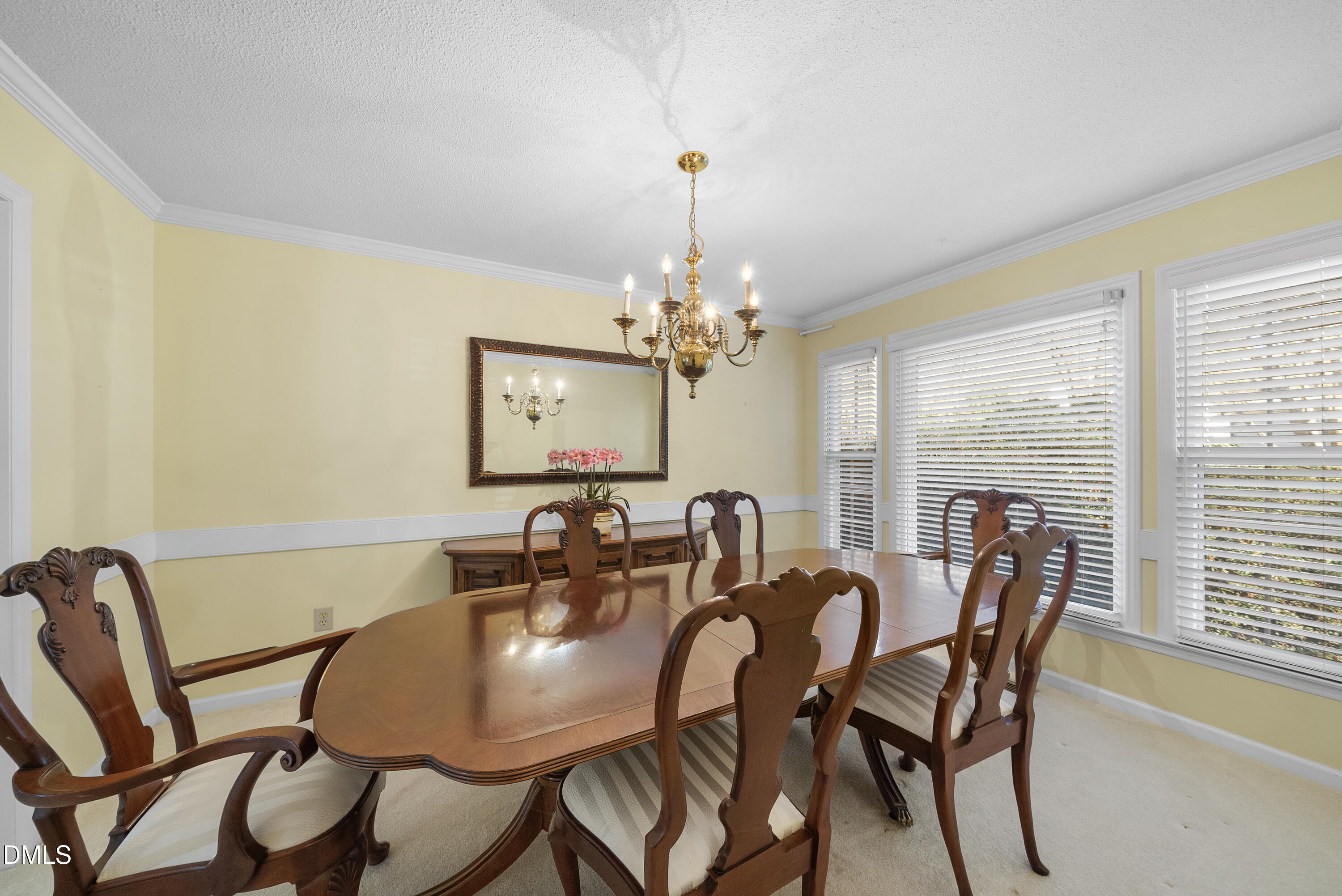7104 Kinross Drive Raleigh, NC 27613 - Photo 13 of 38 a dining room with furniture and window