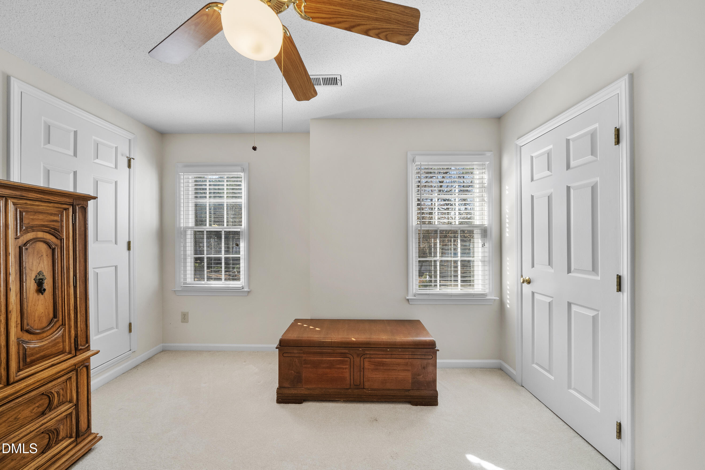 7104 Kinross Drive Raleigh, NC 27613 - Photo 27 of 38 a living room with furniture and a window