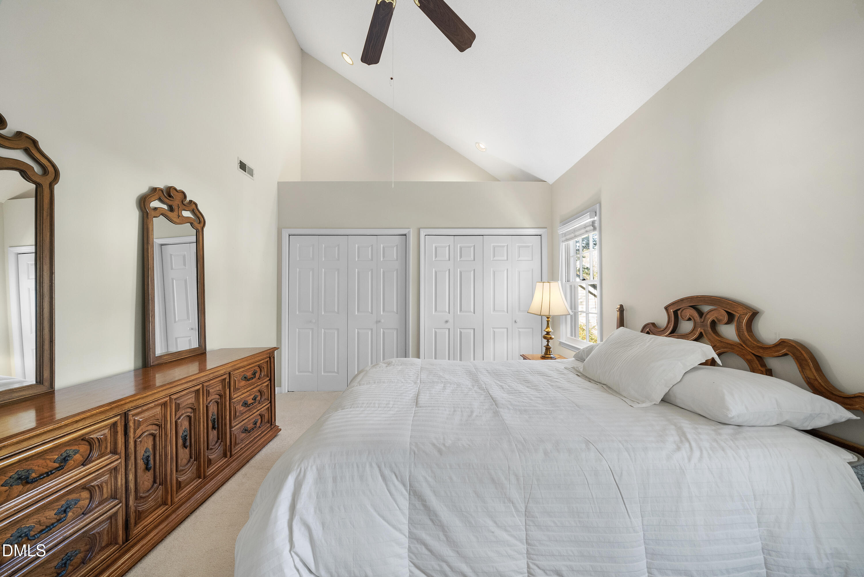 7104 Kinross Drive Raleigh, NC 27613 - Photo 29 of 38 a bedroom with double bed and a large window