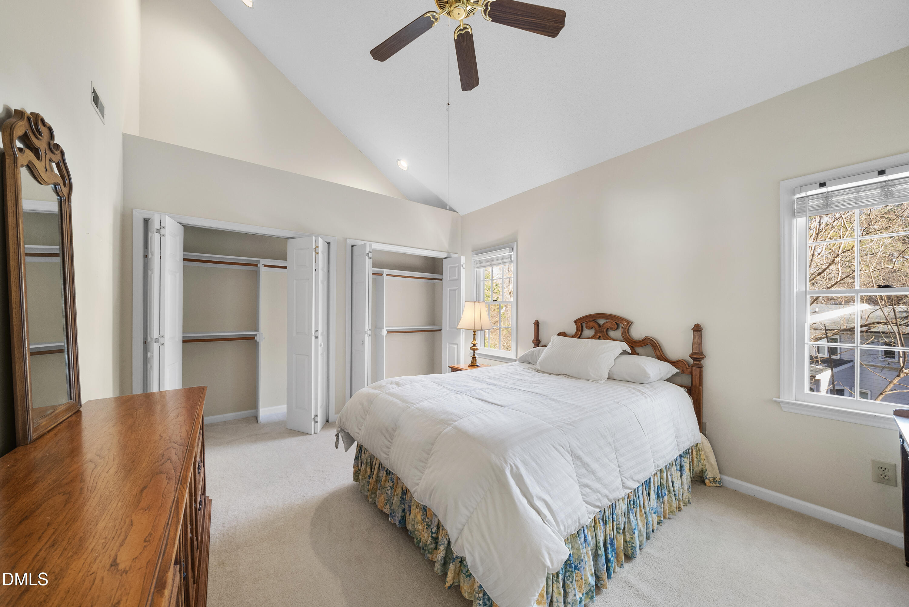 7104 Kinross Drive Raleigh, NC 27613 - Photo 31 of 38 a bedroom with a bed and wooden floor