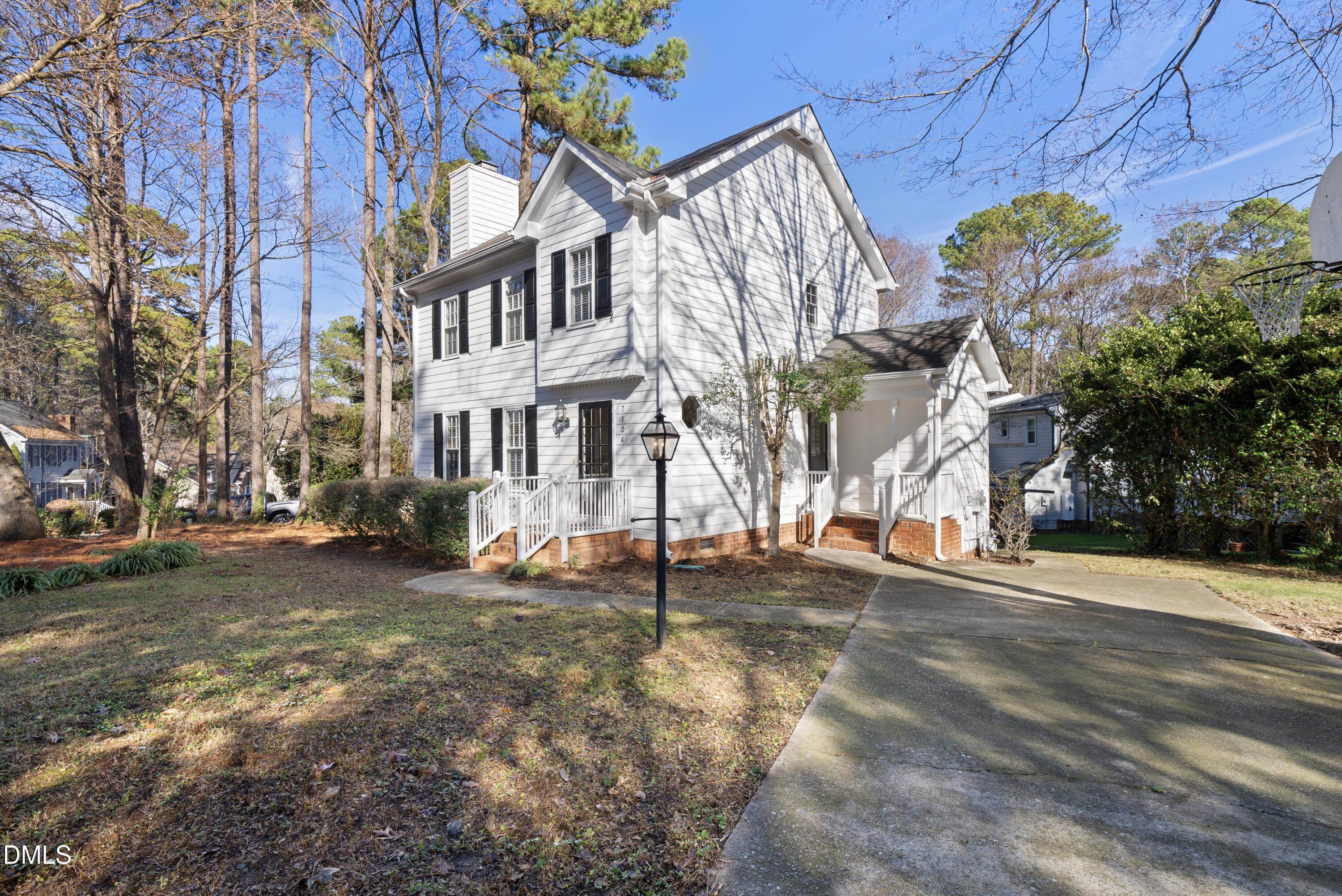 7104 Kinross Drive Raleigh, NC 27613 - Photo 3 of 38 a view of a house with a yard