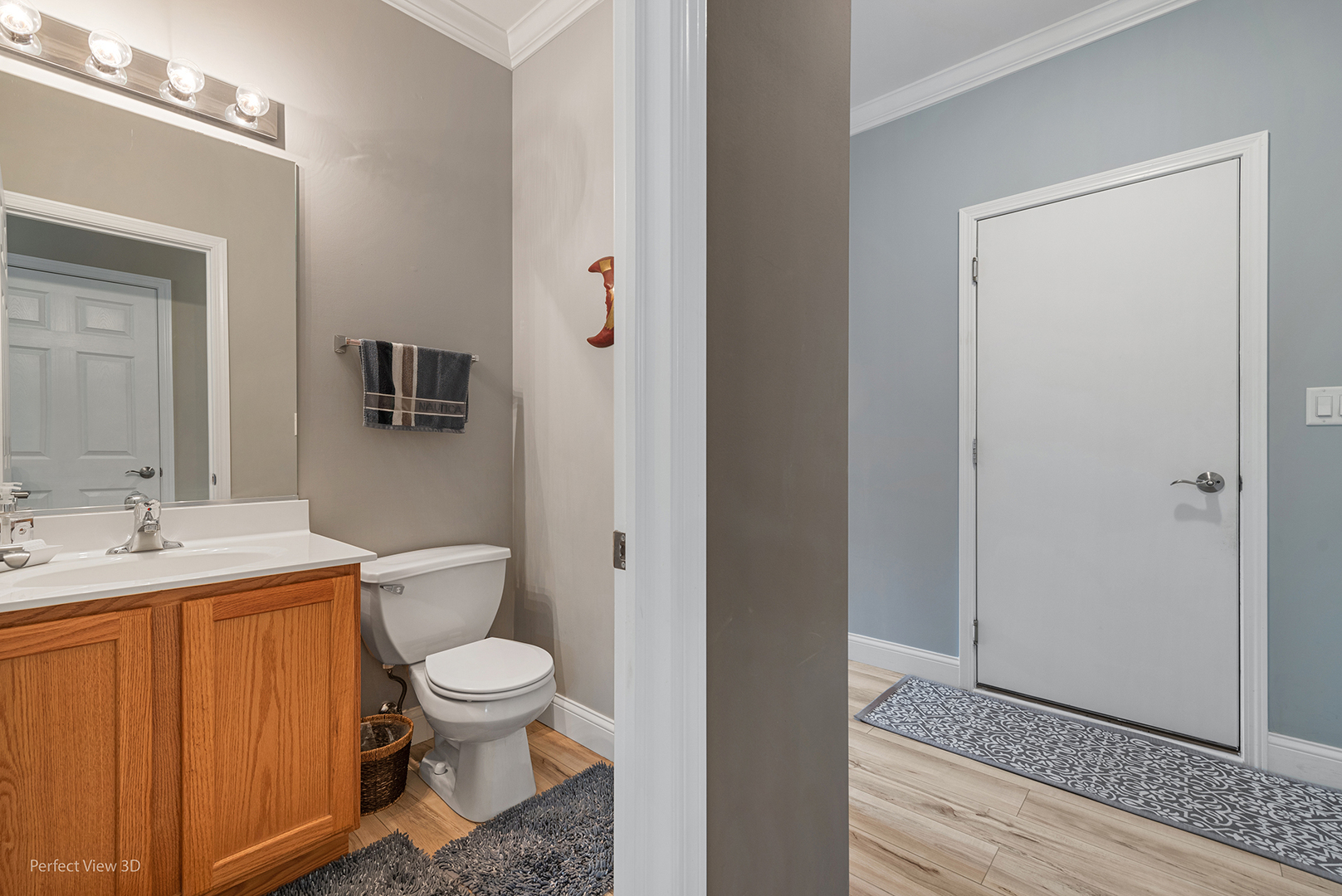 2733 Berman Road North Aurora, IL 60542 - Photo 6 of 24 a bathroom with a granite countertop toilet a sink and a mirror