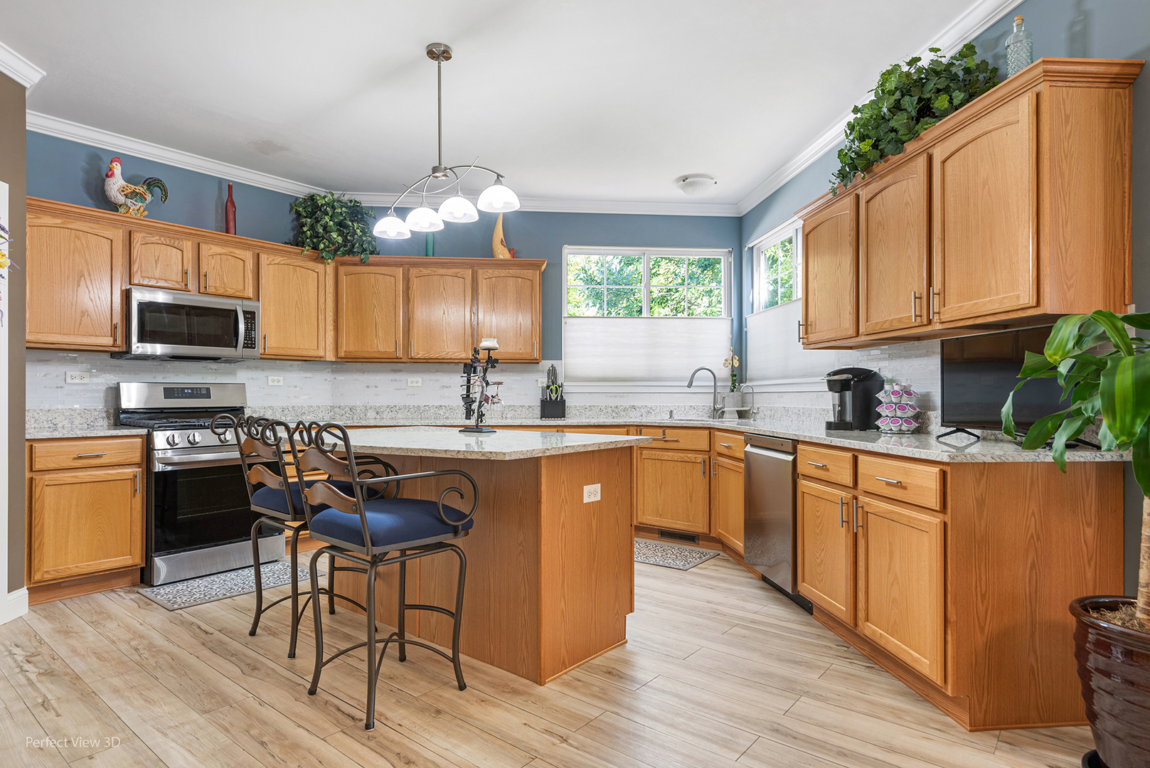 2733 Berman Road North Aurora, IL 60542 - Photo 10 of 24 a kitchen with stainless steel appliances granite countertop a refrigerator a sink dishwasher a stove and a dining table with wooden floor