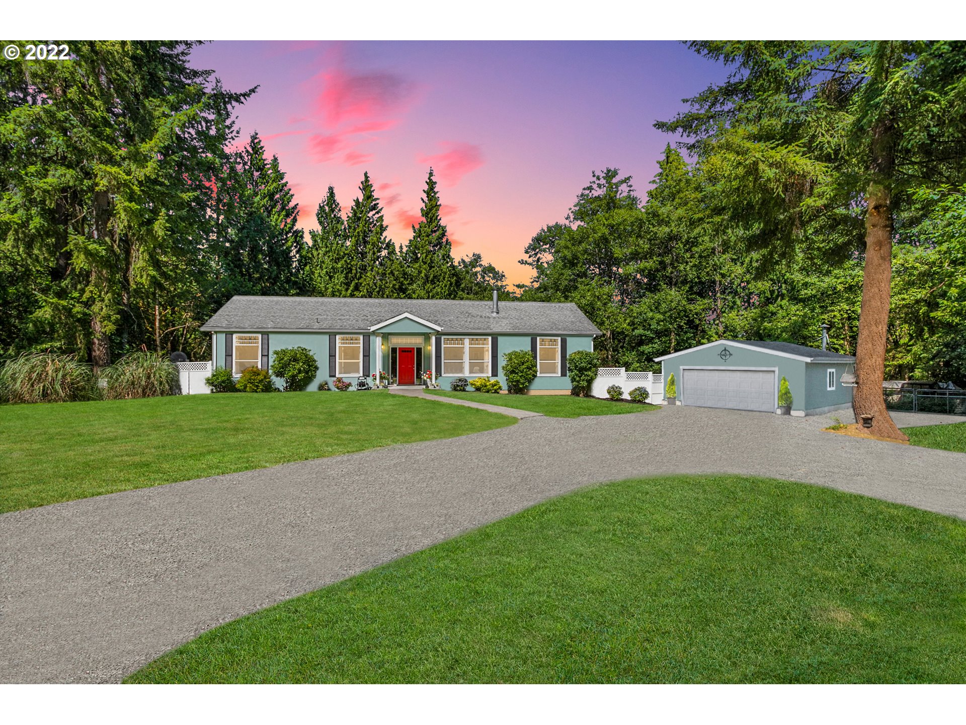 71572 Pruitt Road Rainier, OR 97048 - Photo 1 of 31 a front view of a house with a yard and trees