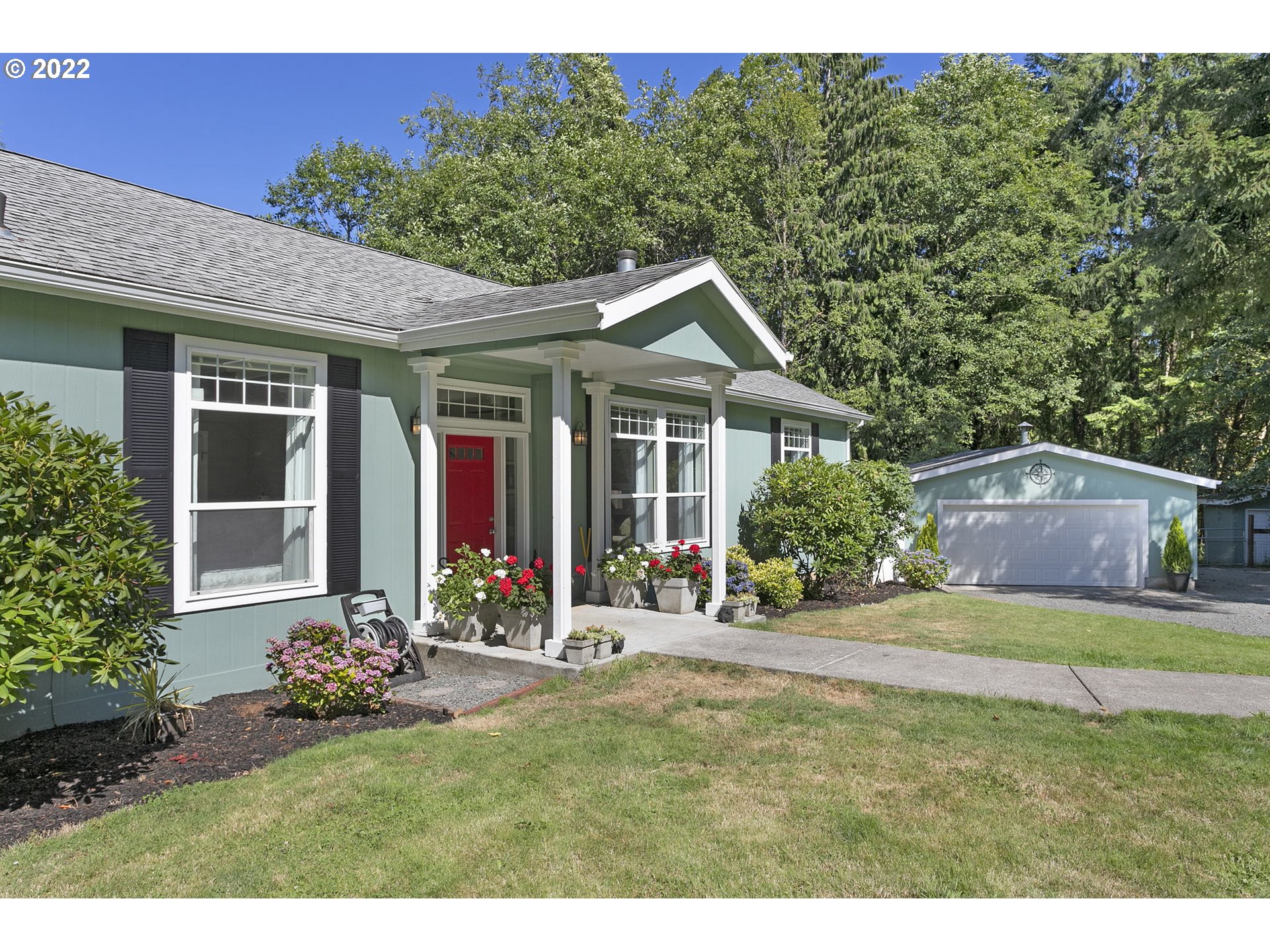 71572 Pruitt Road Rainier, OR 97048 - Photo 3 of 31 a front view of a house with a yard