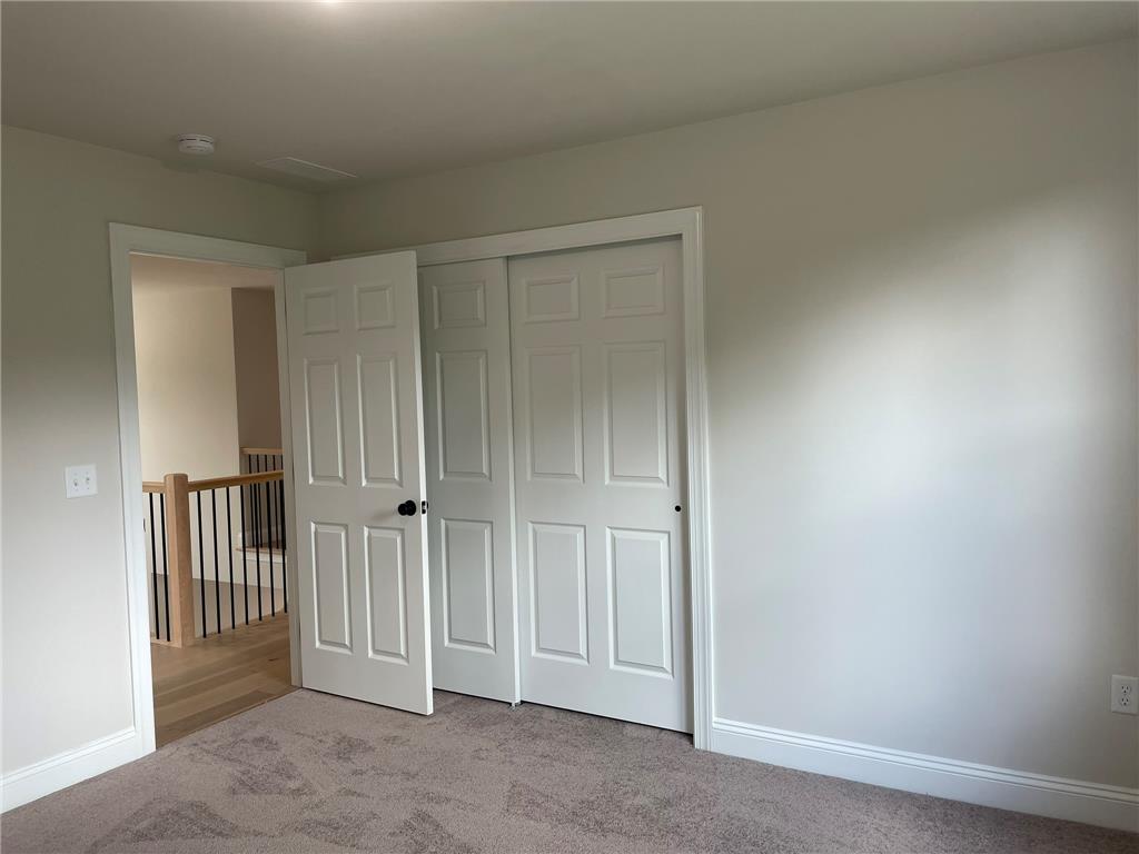 5043 Chapmans Road Orefield, PA 18069 - Photo 27 of 30 A quiet bedroom retreat awaits with plush carpeting and ample closet space.