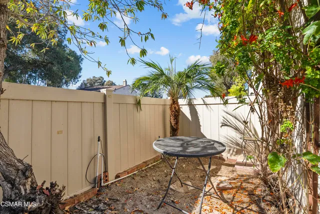 a view of a bench in a garden