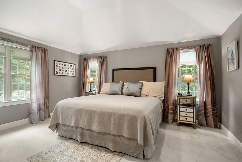 34 Wake Robin Road Sudbury, MA 01776 - Photo 14 of 34 a bedroom with a bed and a window