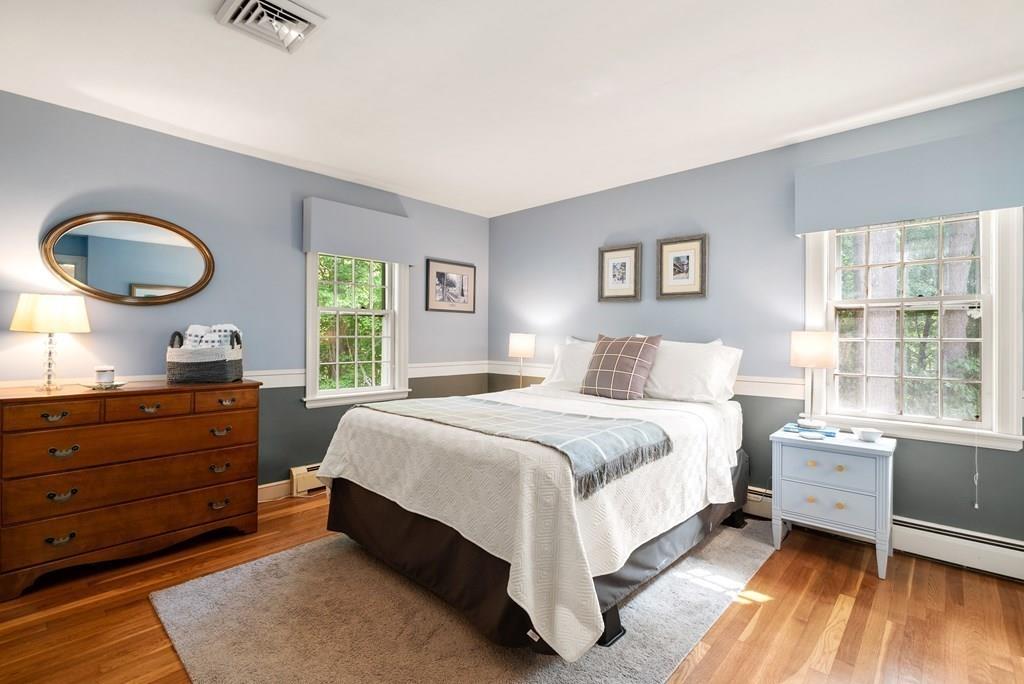 34 Wake Robin Road Sudbury, MA 01776 - Photo 18 of 34 a bedroom with a bed and window