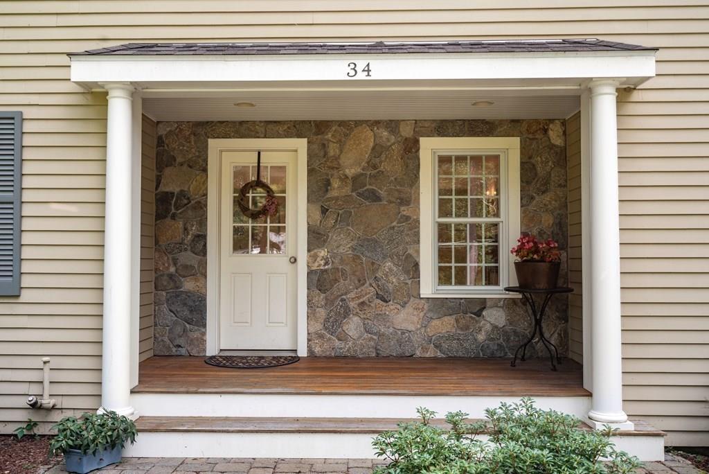 34 Wake Robin Road Sudbury, MA 01776 - Photo 34 of 34 a front view of a house with a yard