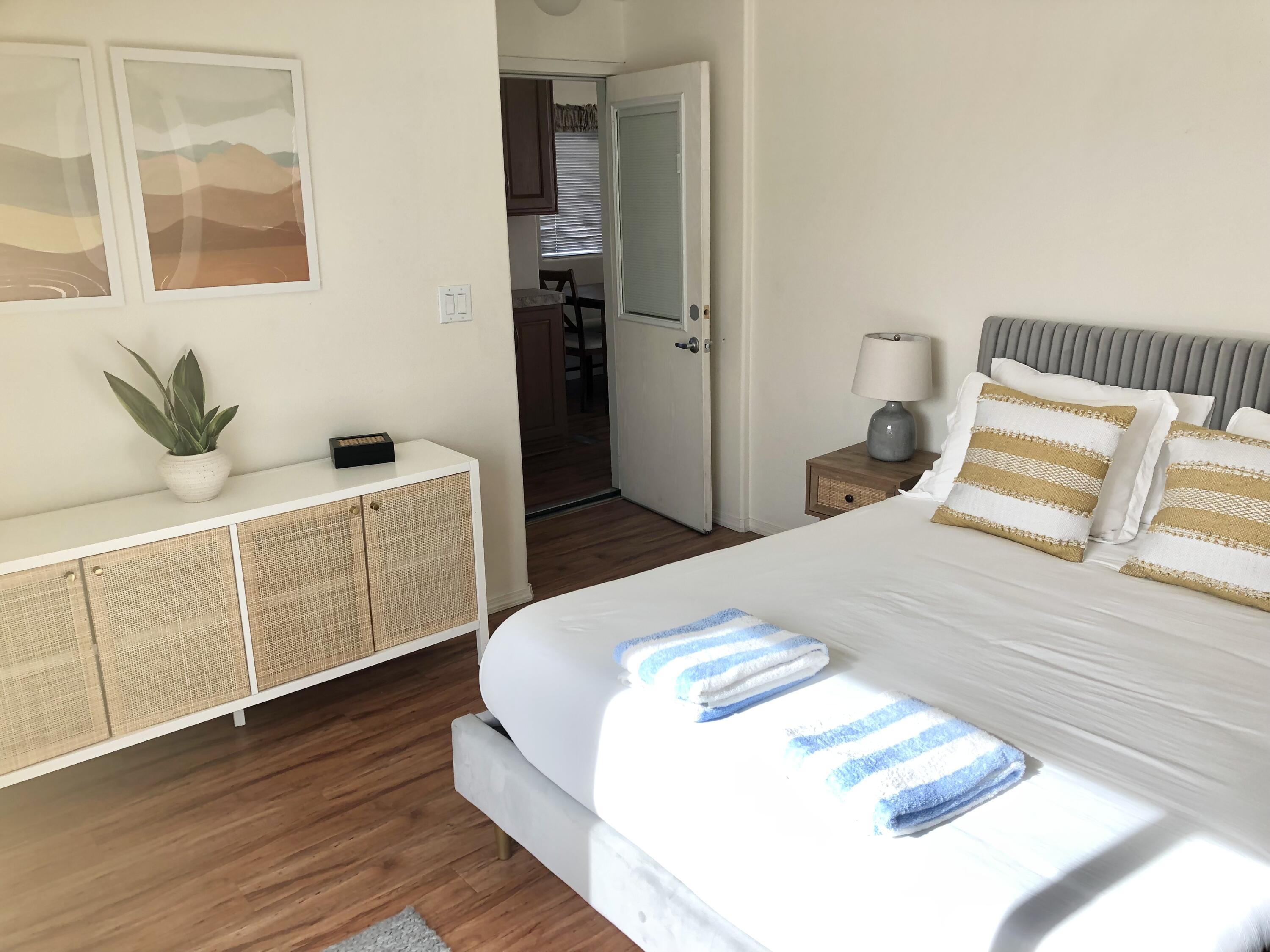 74711 Dillon Road Desert Hot Springs, CA 92241 - Photo 12 of 38 a bedroom with a bed and a window