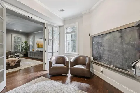 a bedroom with a large bed and a couch