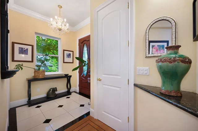 a kitchen with granite countertop a sink and a window