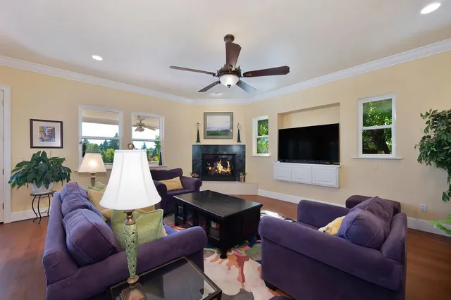 a kitchen with granite countertop a stove and cabinets