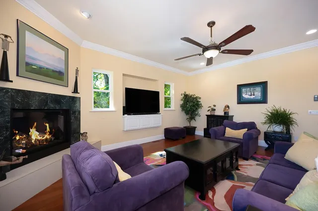 a kitchen with stainless steel appliances granite countertop a stove and a microwave