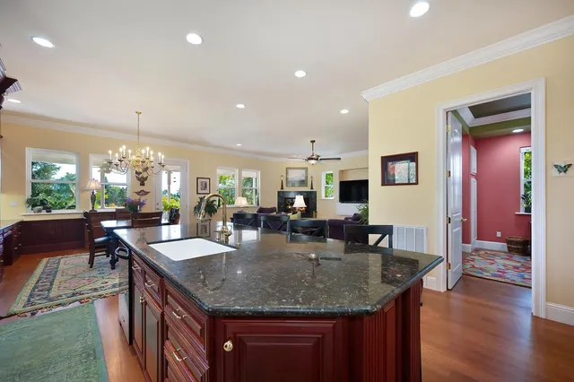 a bathroom with a shower curtain and a sink