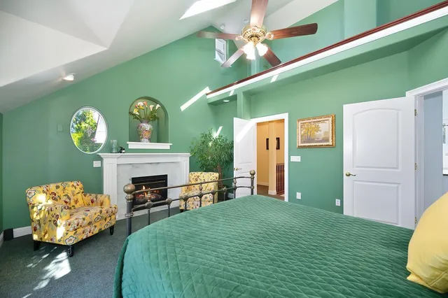 a kitchen with a refrigerator stove and cabinets