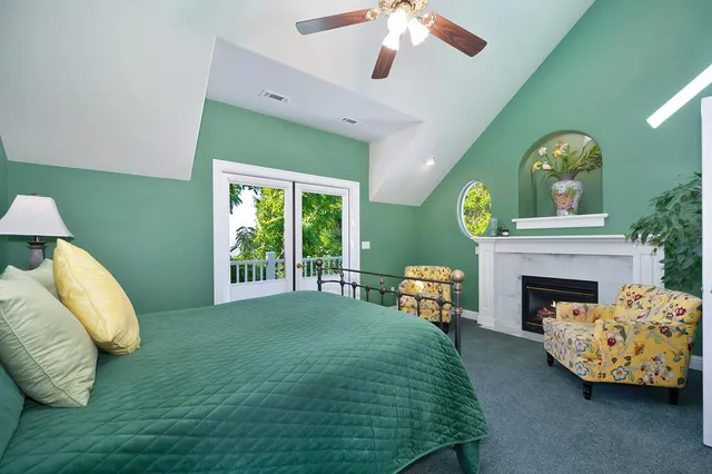 a bedroom with a bed and a walk in closet