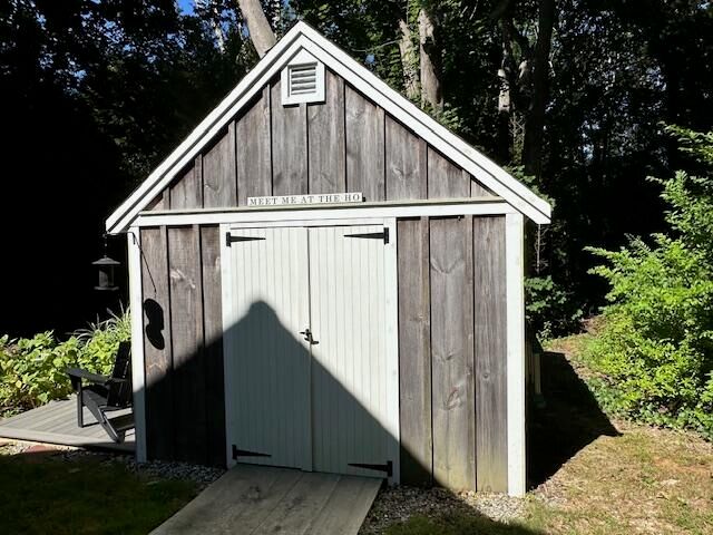 a view of house with river and outdoor space