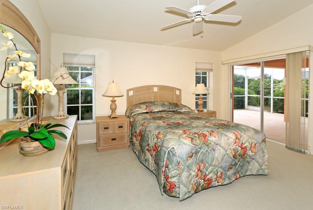214 Napa Ridge Road East Naples, FL 34119 - Photo 6 of 12 a bedroom with bed and window