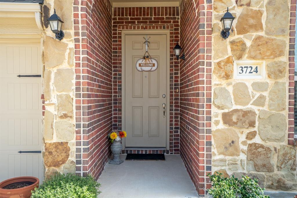 3724 Ranchers Ridge Krum, TX 76249 - Photo 4 of 32 Welcoming entryway with a charming front doorand walkway!