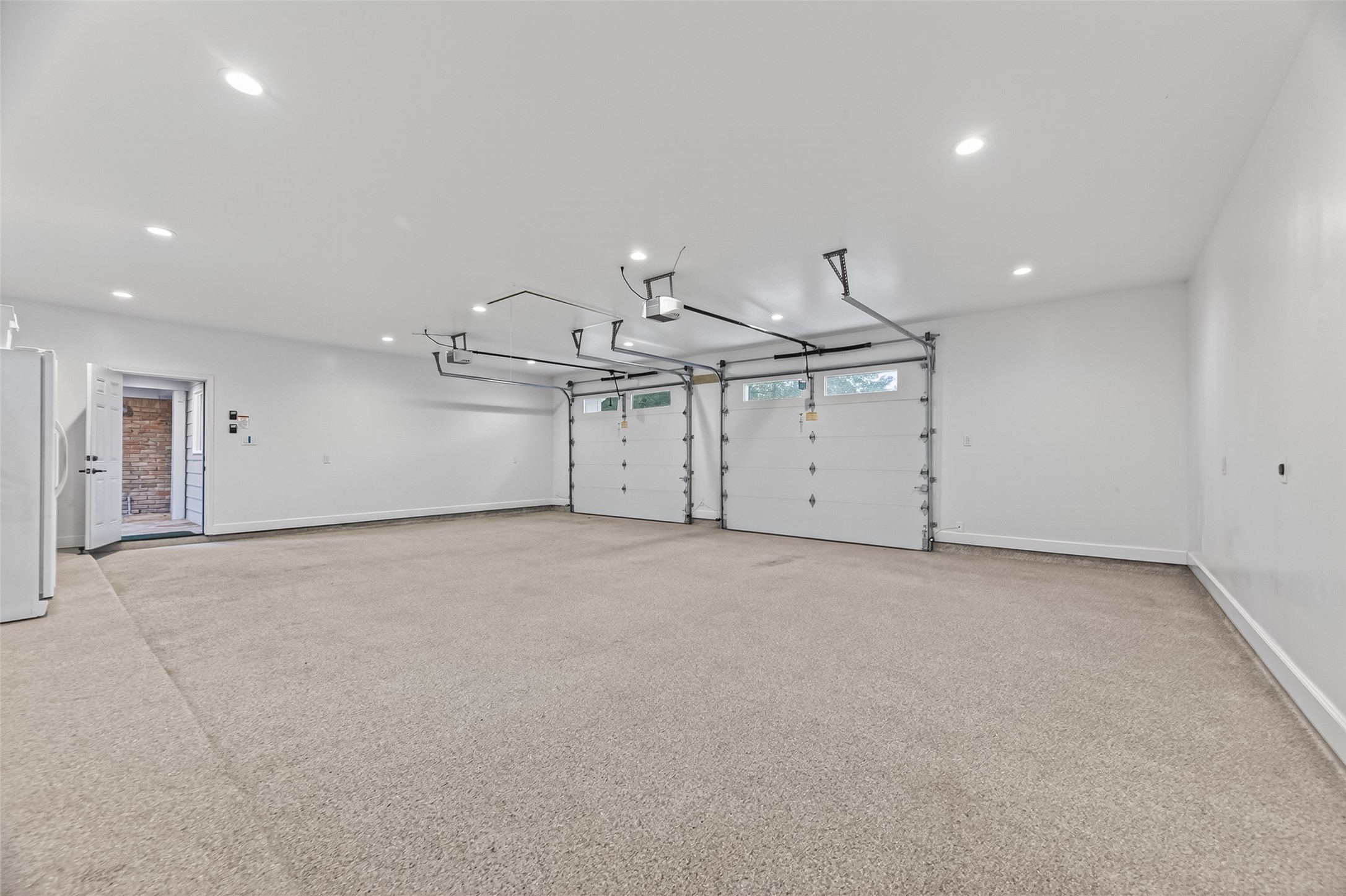 5638 Sanford Road Houston, TX 77096 - Photo 35 of 41 Specialized flooring adds a clean, polished finish to the garage, enhancing both durability and overall appearance.