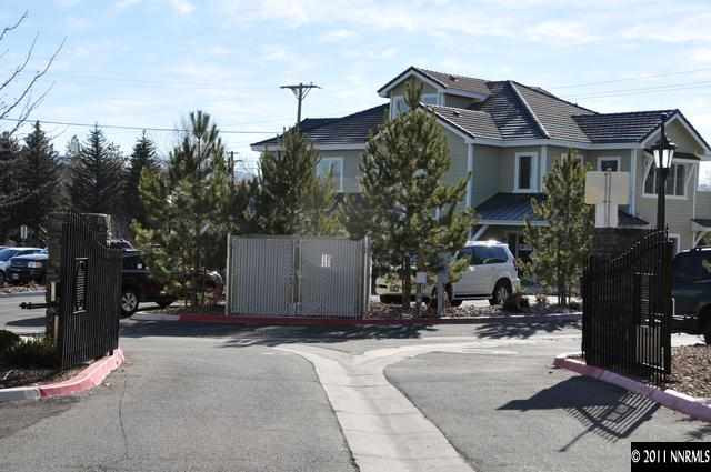 3871 Warren Way Reno, NV 89509 - Photo 2 of 13 a front view of a house with a yard