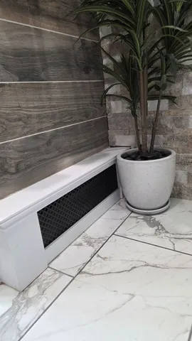 a view of potted plant in a kitchen