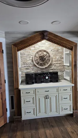 a kitchen with a stove and a microwave