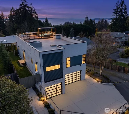 a aerial view of a house with a yard