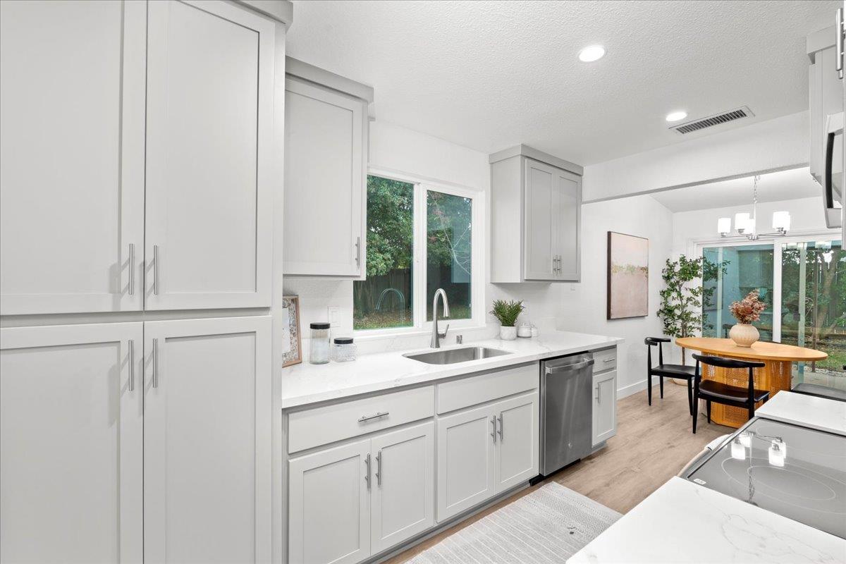 6637 Briartree Way Citrus Heights, CA 95621 - Photo 11 of 23 a kitchen with a sink and cabinets