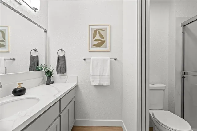 a bathroom with a sink and a toilet