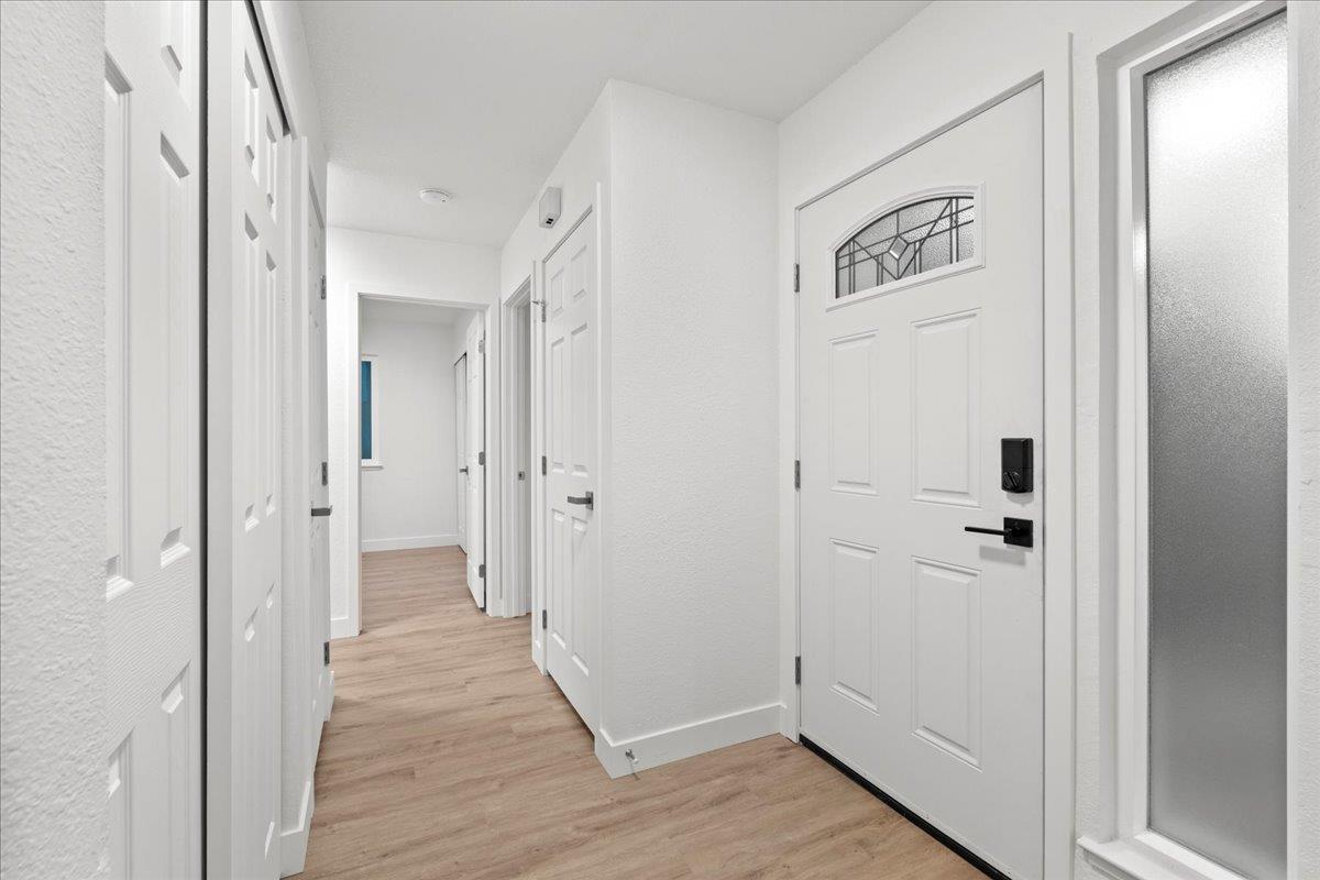 6637 Briartree Way Citrus Heights, CA 95621 - Photo 4 of 23 a view of a hallway with wooden floor