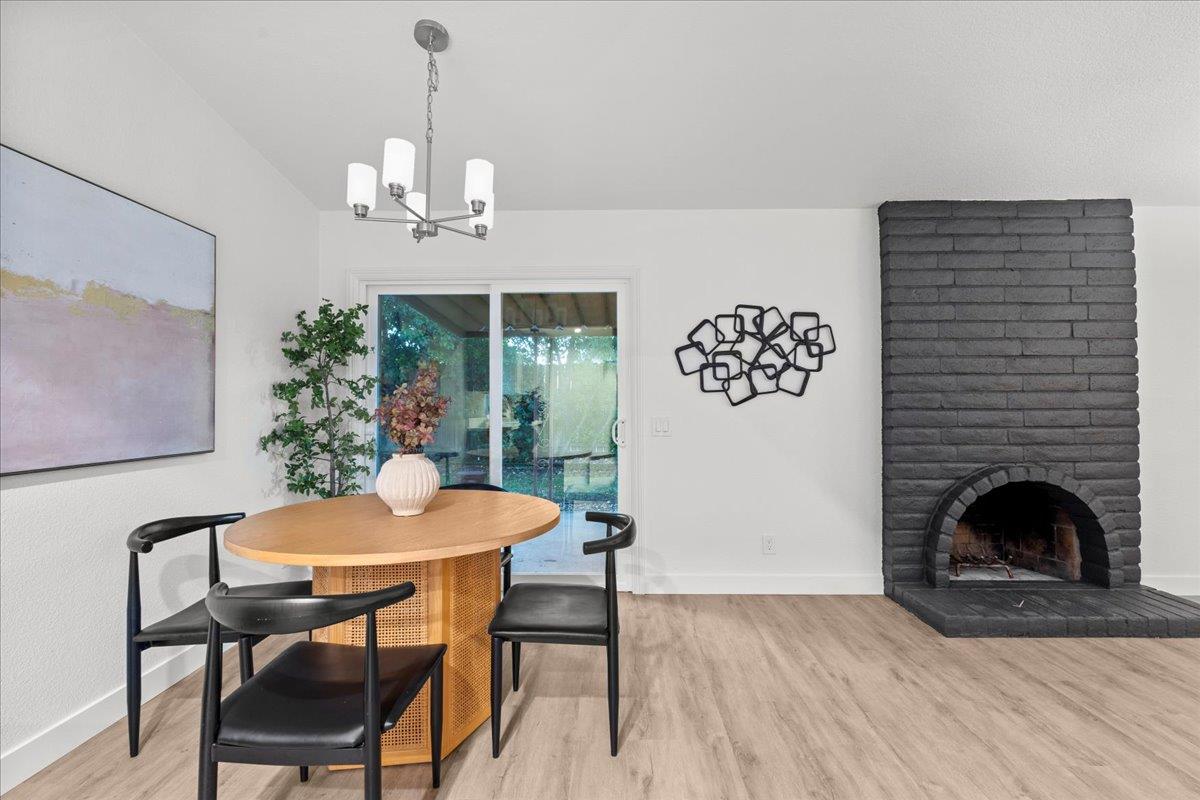 6637 Briartree Way Citrus Heights, CA 95621 - Photo 9 of 23 a view of a dining room with furniture and chandelier