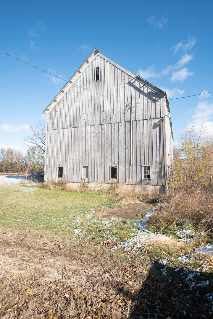 23396 Ideal Road Chadwick, IL 61014 - Photo 14 of 23 a large building with a yard