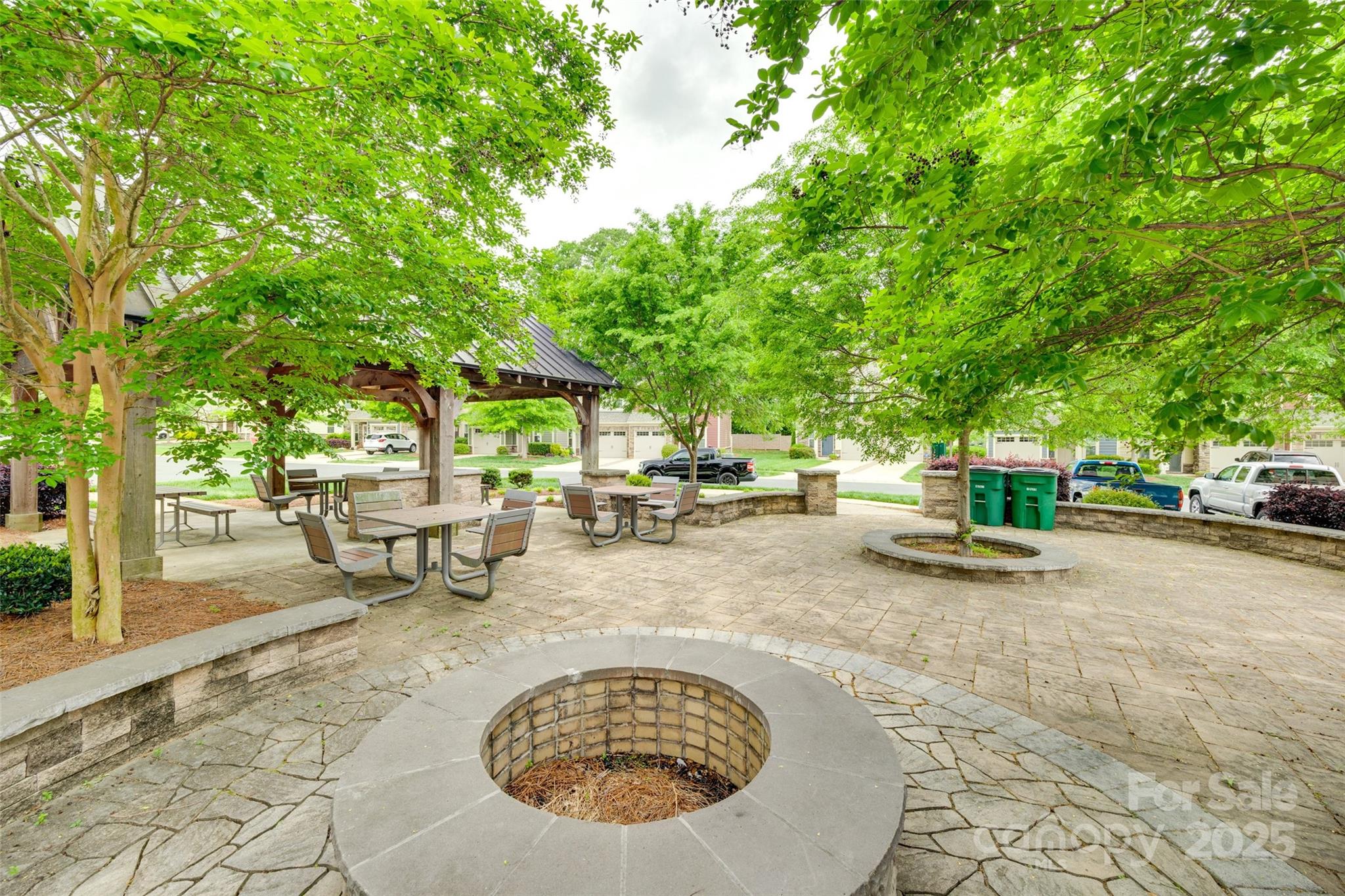 a view of a swimming pool with chairs in patio