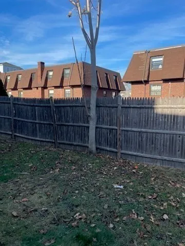a view of a yard in front of a house
