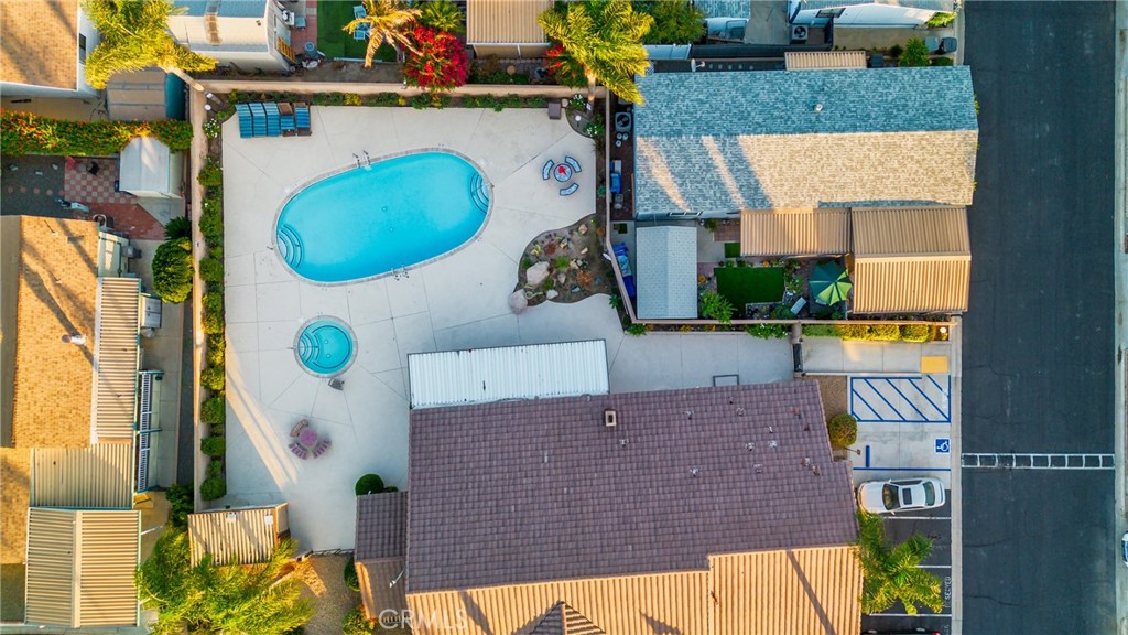 21650 Temescal Canyon Road, Unit 13 Corona, CA 92883 - Photo 20 of 21 an aerial view of a house with a swimming pool