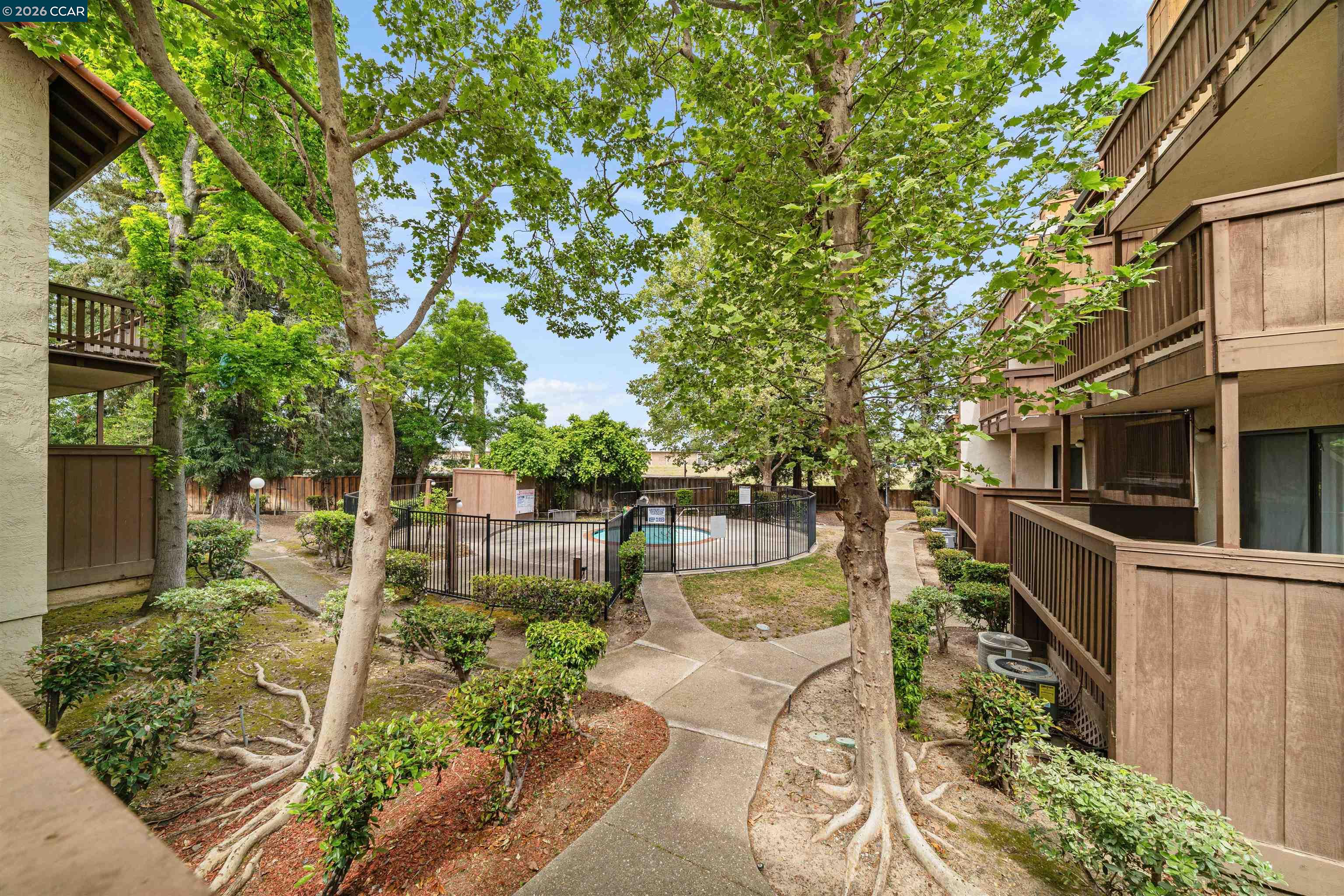 2055 Sierra Road, Unit 106 Concord, CA 94518 - Photo 9 of 37 a view of a garden with sitting area