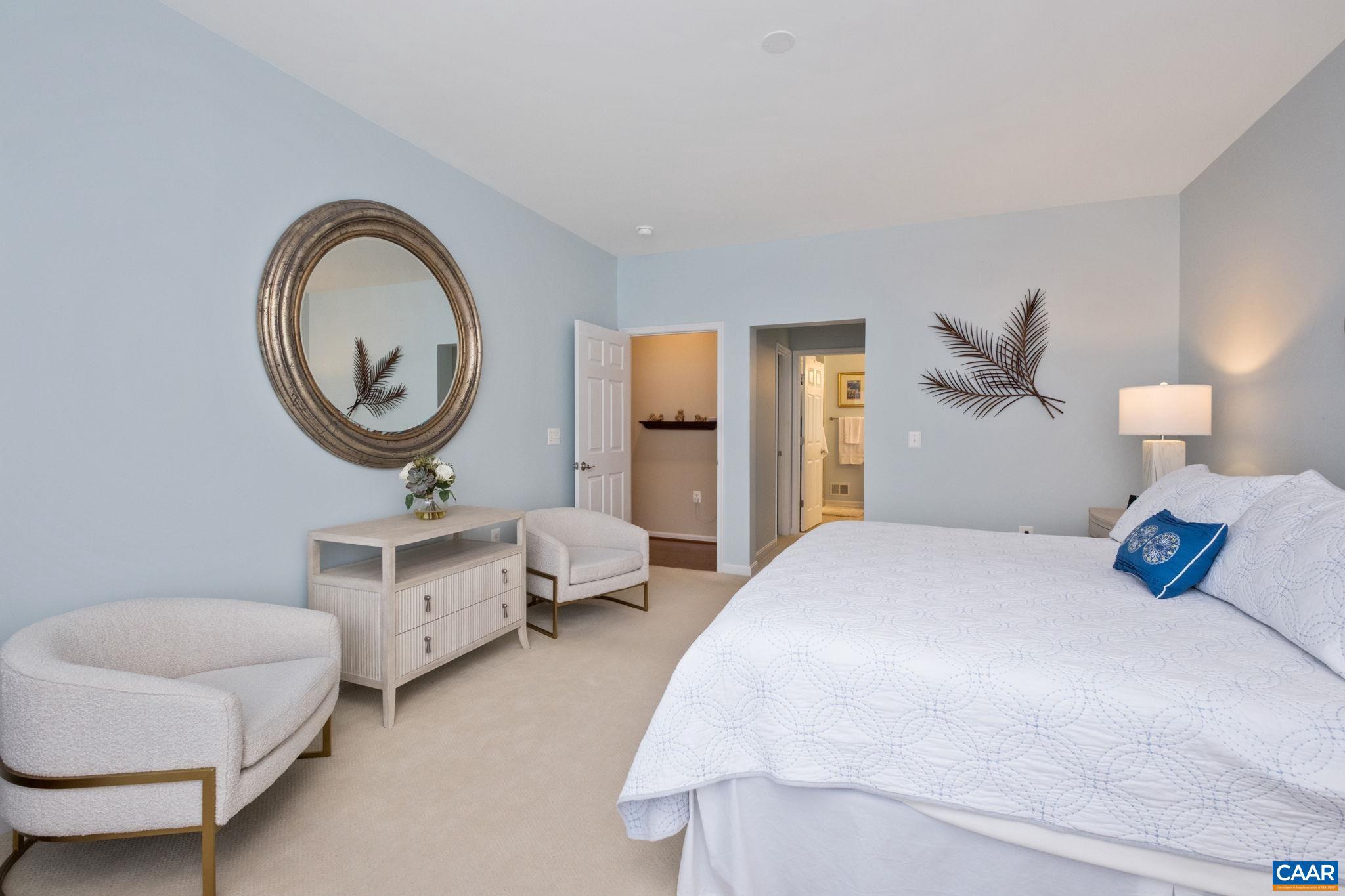 56 John Rucker Drive Ruckersville, VA 22968 - Photo 18 of 38 a bedroom with bed and a chandelier