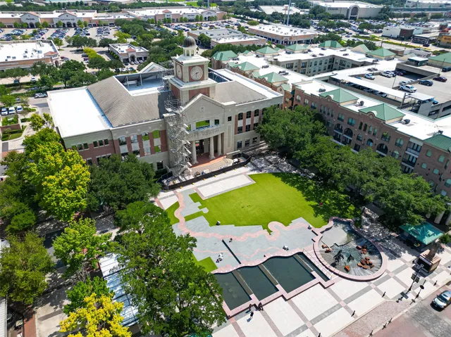 a view of a swimming pool with a lounge chairs