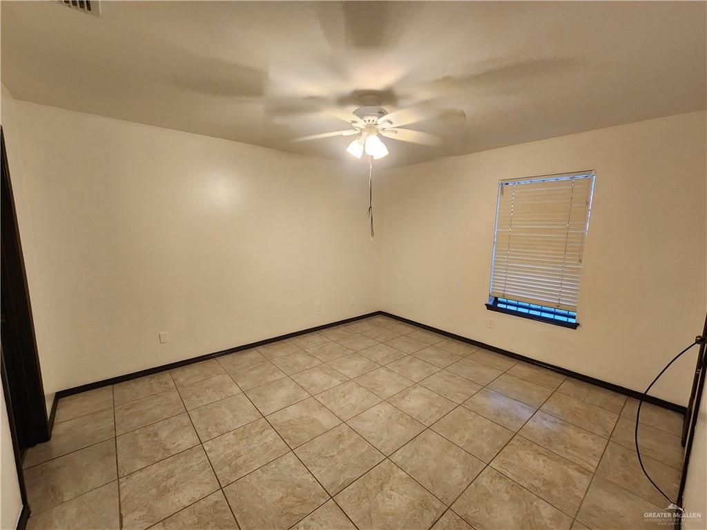 600 Toronto Avenue, Unit 18 McAllen, TX 78503 - Photo 12 of 17 en empty room with windows
